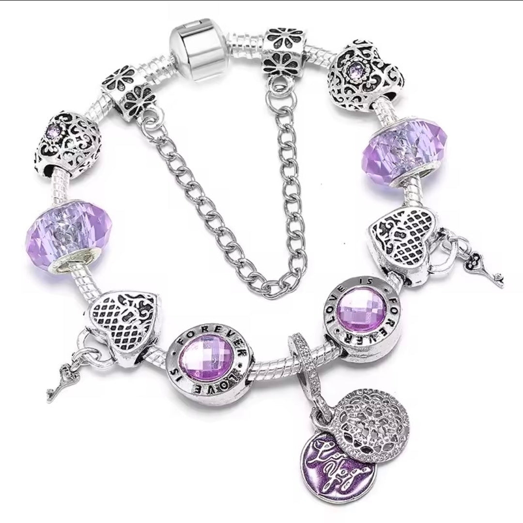 Kids Ludere Purple charm bracelet sprinkled with charms